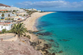 Apartment near the beach with a huge terrace patio, wifi and parking